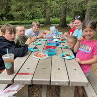 June 2026 kids with their enemy pies